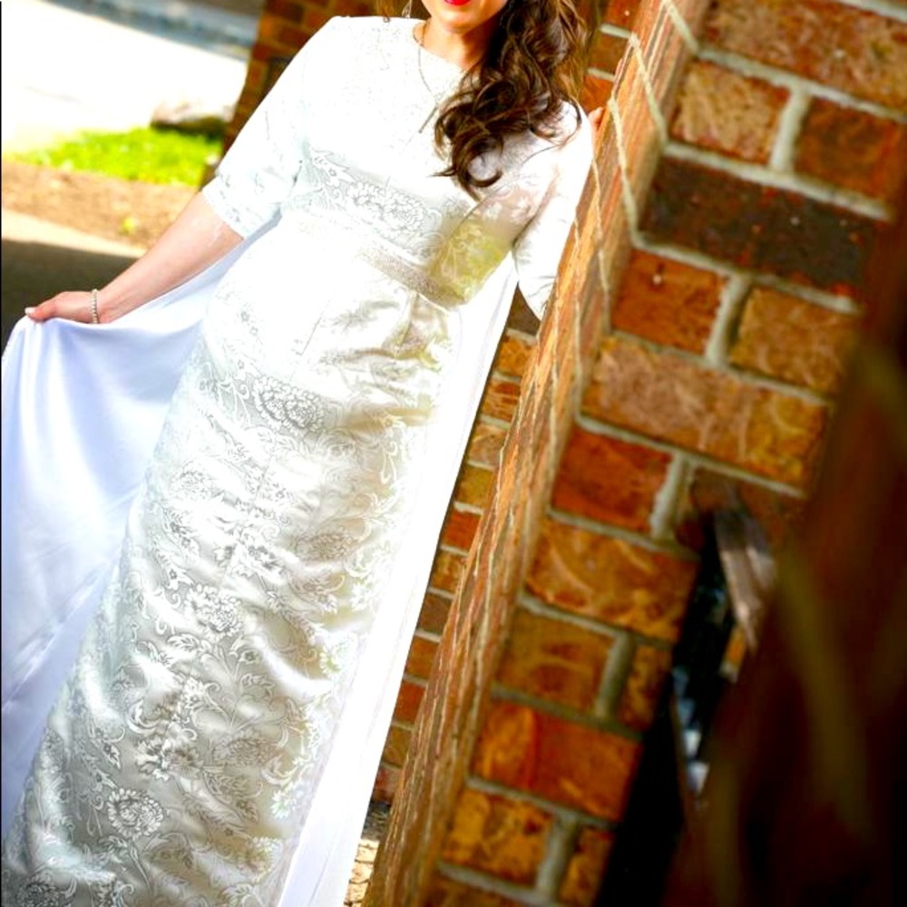 Women’s custom made white wedding gown